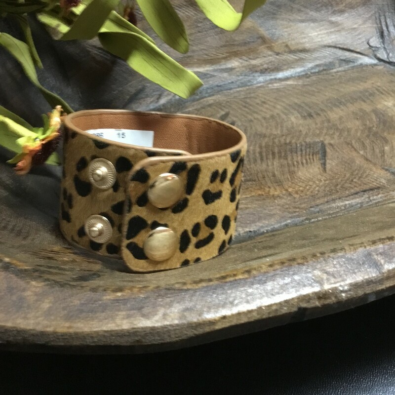 Leopard cuff with cream colored stones! Adjustable from 6.5 to 7 inches.