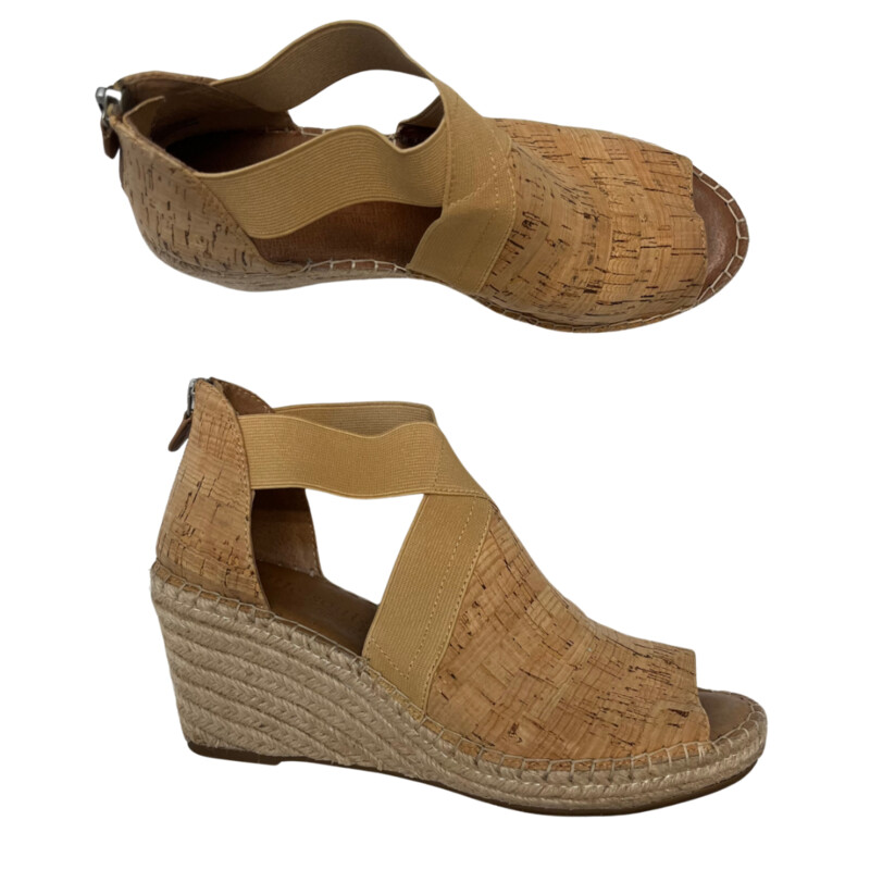 Gentle Souls by Kenneth Cole<br />
<br />
Colleen Cork Espadrille Wedge Heel Sandal<br />
Versatile neutral color with back zip for easy on and off. Elastic straps for optimal fit and comfort. Lightweight. Jute wrapped espadrille wedge heel. Non-slip outsole. Padded footbed.<br />
<br />
Size: 9.5