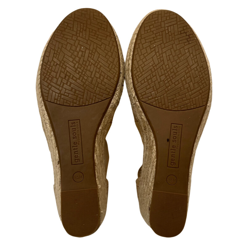 Gentle Souls by Kenneth Cole<br />
<br />
Colleen Cork Espadrille Wedge Heel Sandal<br />
Versatile neutral color with back zip for easy on and off. Elastic straps for optimal fit and comfort. Lightweight. Jute wrapped espadrille wedge heel. Non-slip outsole. Padded footbed.<br />
<br />
Size: 9.5