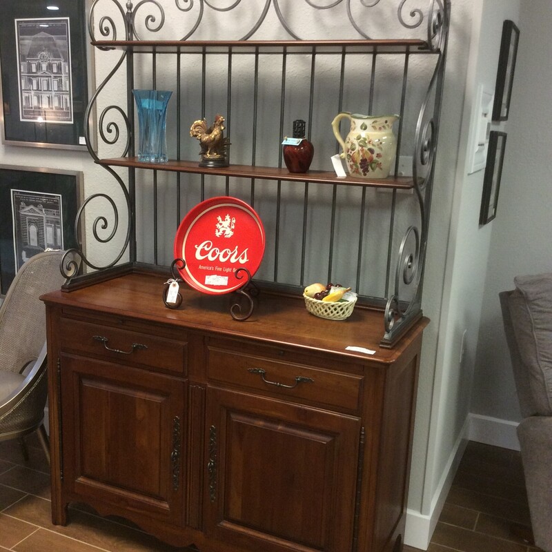 Ethan Allen Bakers Rack with a cherry wood finish.  Beautiful metal scroll work on the sides and top.  Size: 50x20x7