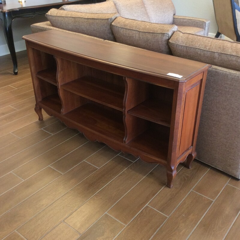 Great piece!  Wooden console with 3 shelves for each space that are removable.  Size: 57x15x30
