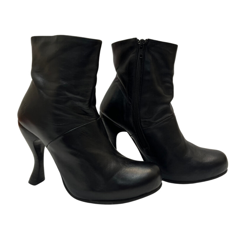 John Fleuvog Jolie Boots<br />
Super Soft leather<br />
Side Zipper<br />
Classic Fleuvog Heel<br />
Color:  Black<br />
Size: 6.5