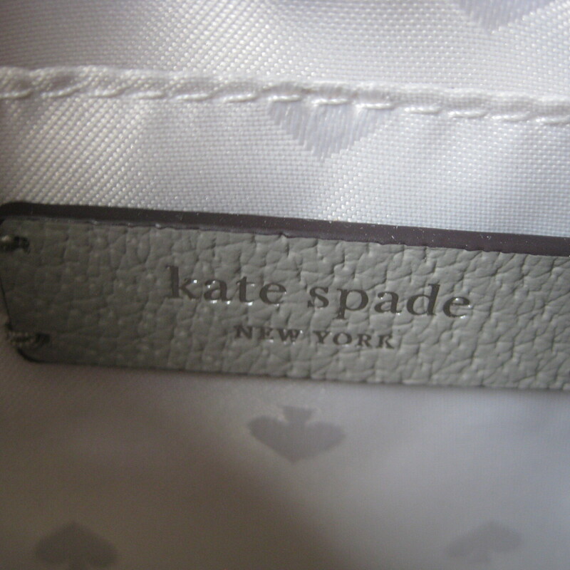 Brand new kate spade ny Jeanne bag, crossbody in soft taupe , appears as a soft pale gray.<br />
top zipper<br />
silver hardware<br />
spade logo lining<br />
one slip pocket inside<br />
one slip pocket outside<br />
9.5 x 6.25 x 3<br />
adjustable crossbody strap min: 22 max: 25<br />
<br />
Thanks for looking1<br />
#73501