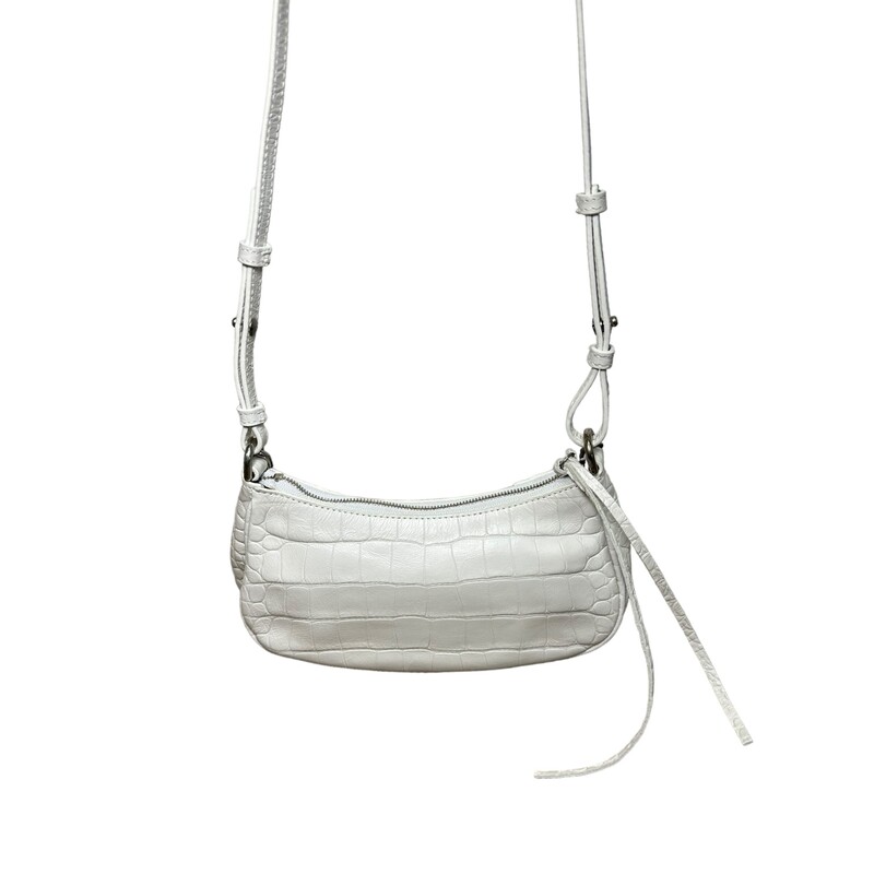 Balenciaga Le Cagole, White, Size: Mini

Dimensions:
L8.2 x H5.1 x W1.7 inch
Shoulder chain strap with one hook (15.7 inch)
Adjustable and removable crossbody strap (40.5 inch)

Code:695814.9016.B584946