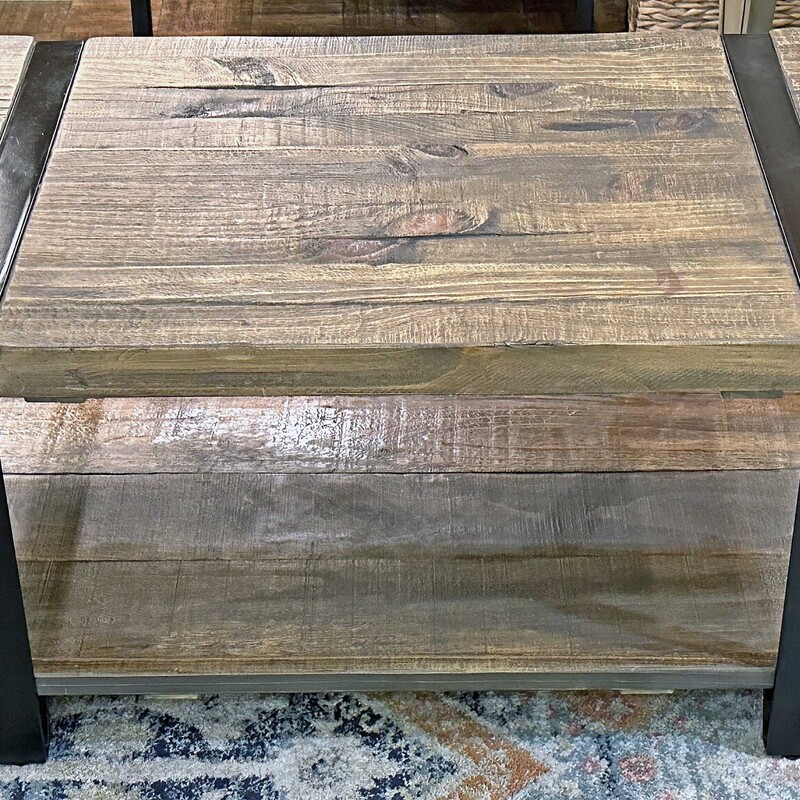 Two Tier Wood and Metal Coffee Table
42 In Wide x 24 In Deep x 18 In Tall.