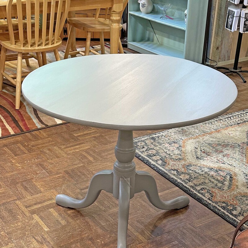 Round Gray Pedestal Table