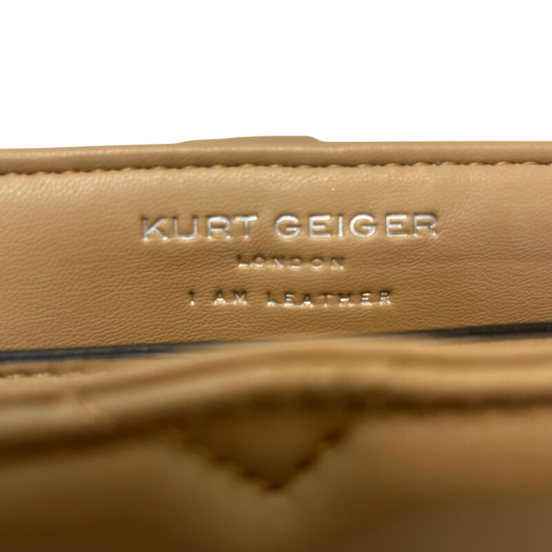 Kurt Geiger Kensington Handbag<br />
Quilted with Chain Strap<br />
2 Magnetic Snap Closures and Interior Wall Pocket<br />
Eagle Head Jewel Detail for Closure<br />
100% Leather<br />
Color: Warm Beige