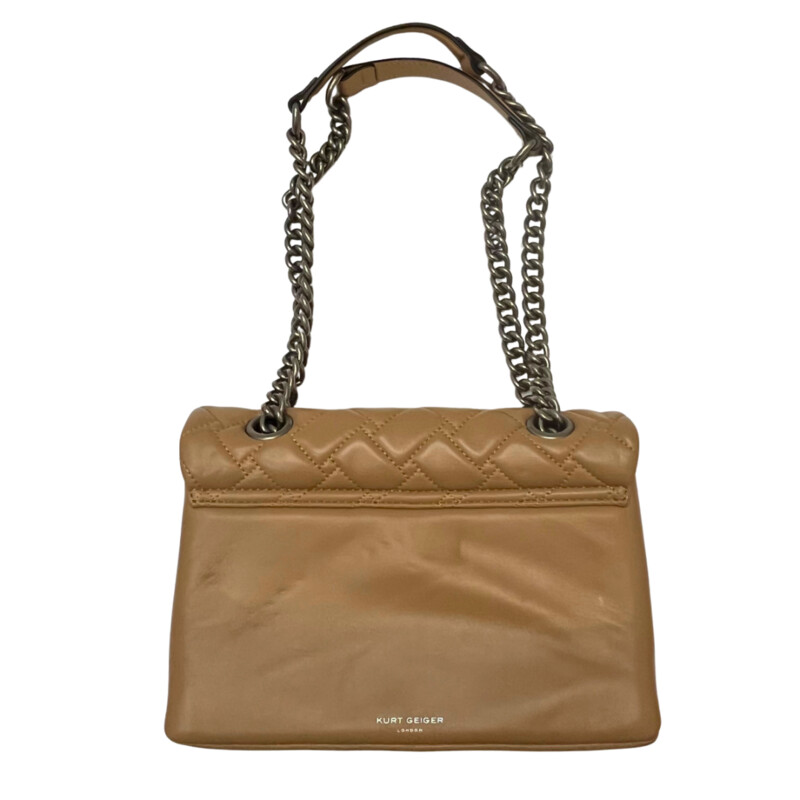 Kurt Geiger Kensington Handbag<br />
Quilted with Chain Strap<br />
2 Magnetic Snap Closures and Interior Wall Pocket<br />
Eagle Head Jewel Detail for Closure<br />
100% Leather<br />
Color: Warm Beige