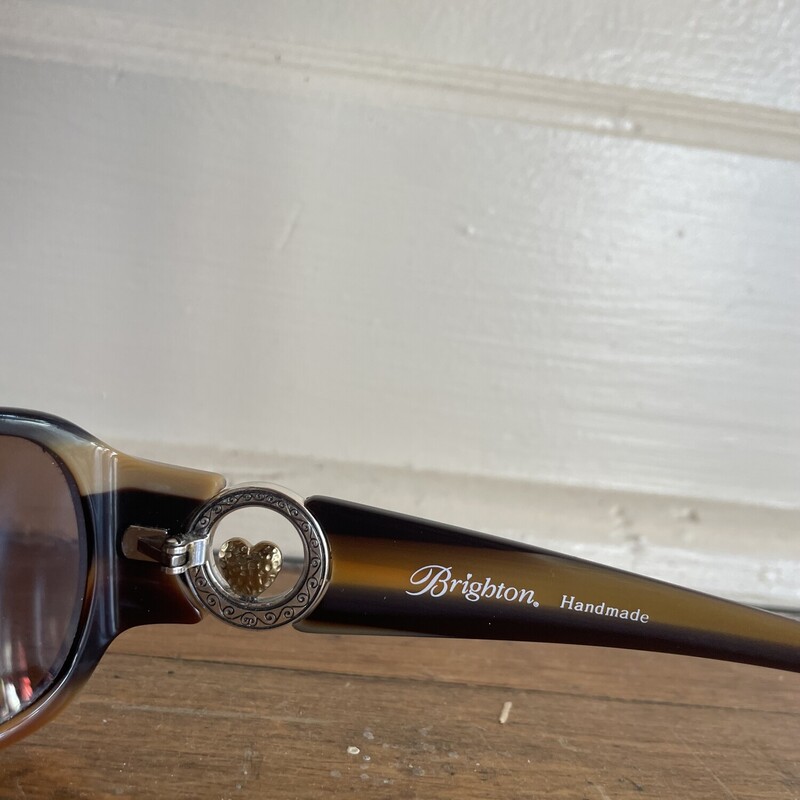 Brighton HeartOfGold Sunglasses,<br />
<br />
PreOwned Heart Of Glod Sunglasses<br />
serial numberA11354-130<br />
<br />
All Sales Are Final<br />
No Returns<br />
<br />
Shipping Is Available<br />
OR<br />
Pick Up In Store Within 7 Days of Purchase<br />
<br />
Thank you for shopping with Us  :-)