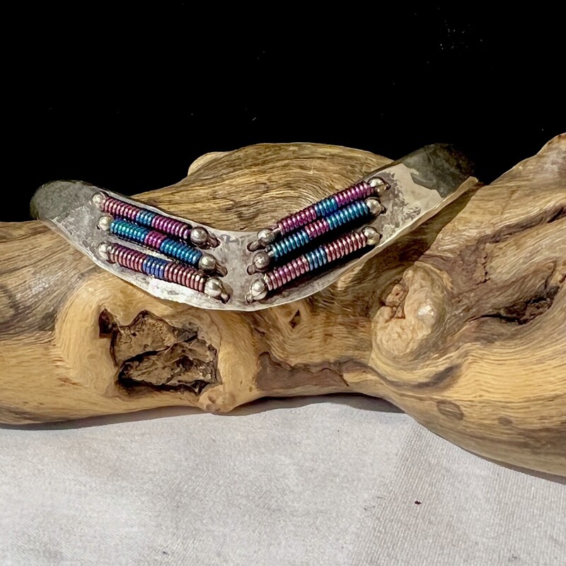 Silver tone bracelet with Blue & Pink Coils