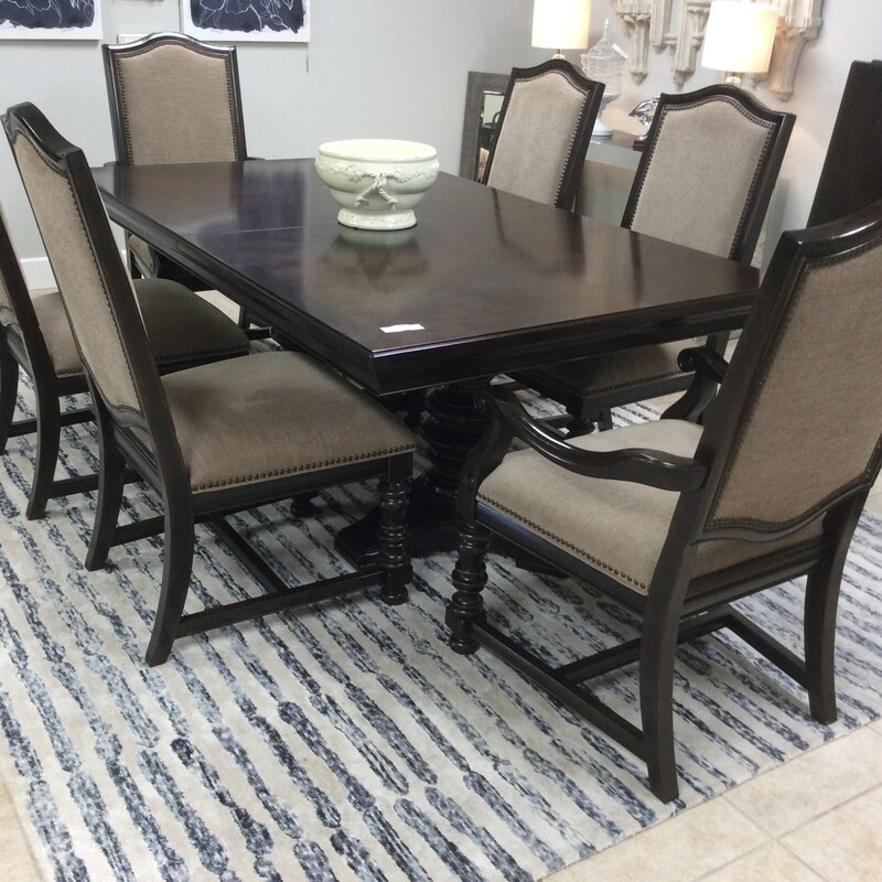 This 76 Star Furniture Dining Room Set has a dark wood finish with 6 chairs.