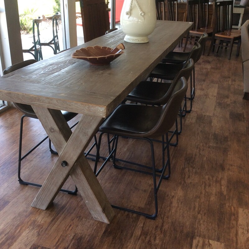 This Counter height rustic farmTable has a weathered wood finish and 8 Stools.
