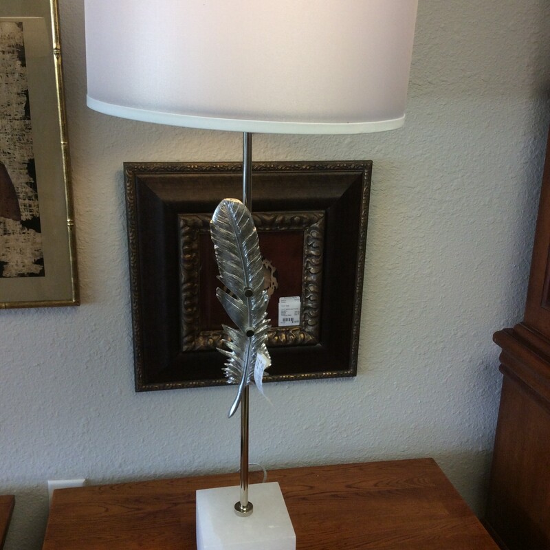 This Lamp has an Alabaster block base displaying a silver feather.