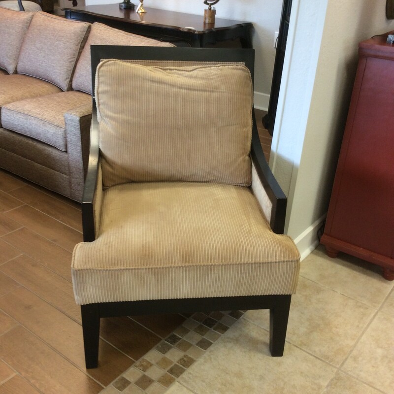 This Arm Chair is upholstered in a Tan Corduroy fabric.