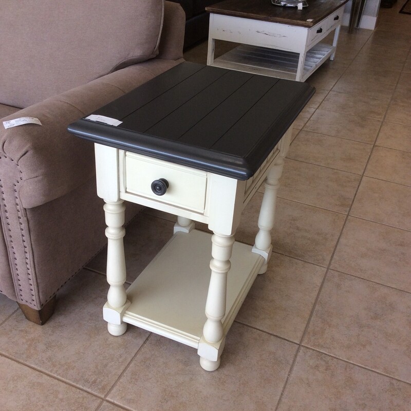 This Coffee Table and 2 EndTables from Ashley Furniture have a two tone painted finish.