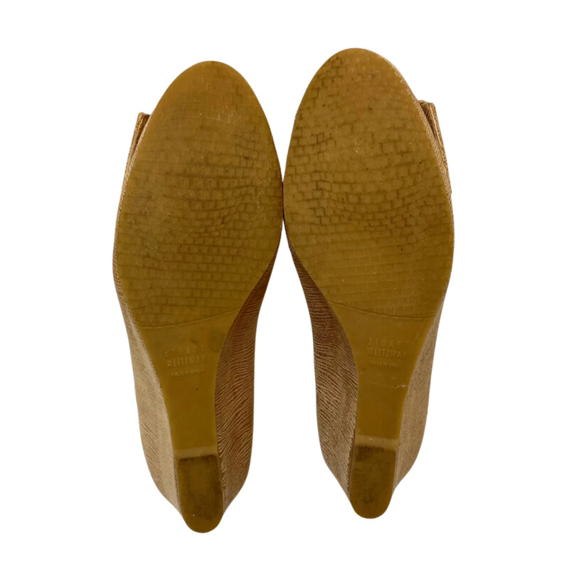 Stuart Weitzman Bucalina Buckle Pumps<br />
Textured Reptile Print<br />
Wedge Heel<br />
Color: Tan<br />
Size: 6.5