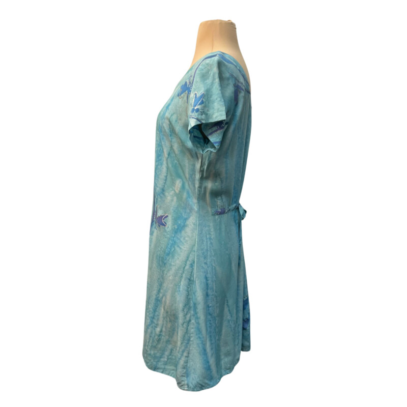 Tropical Tantrum Dress Set<br />
Batik Print<br />
Calla Lily and Butterfly Design<br />
Short Sleeve Dress with Matching Scarf<br />
Drawstring Back for Adjustability<br />
100% Rayon<br />
Colors: Mint, Blue, and purple<br />
Size: Small