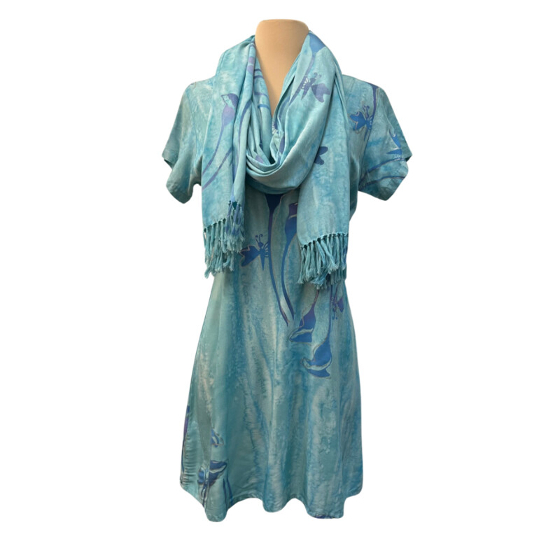 Tropical Tantrum Dress Set<br />
Batik Print<br />
Calla Lily and Butterfly Design<br />
Short Sleeve Dress with Matching Scarf<br />
Drawstring Back for Adjustability<br />
100% Rayon<br />
Colors: Mint, Blue, and purple<br />
Size: Small