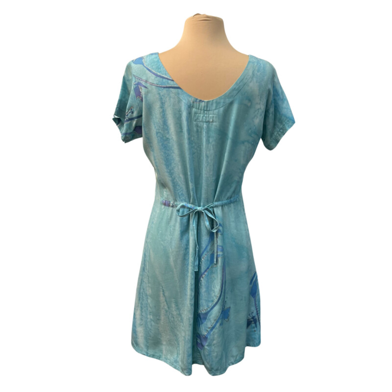 Tropical Tantrum Dress Set<br />
Batik Print<br />
Calla Lily and Butterfly Design<br />
Short Sleeve Dress with Matching Scarf<br />
Drawstring Back for Adjustability<br />
100% Rayon<br />
Colors: Mint, Blue, and purple<br />
Size: Small