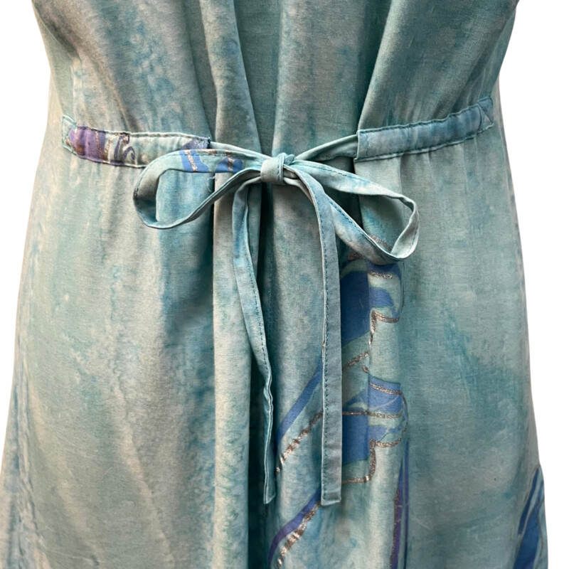 Tropical Tantrum Dress Set<br />
Batik Print<br />
Calla Lily and Butterfly Design<br />
Short Sleeve Dress with Matching Scarf<br />
Drawstring Back for Adjustability<br />
100% Rayon<br />
Colors: Mint, Blue, and purple<br />
Size: Small