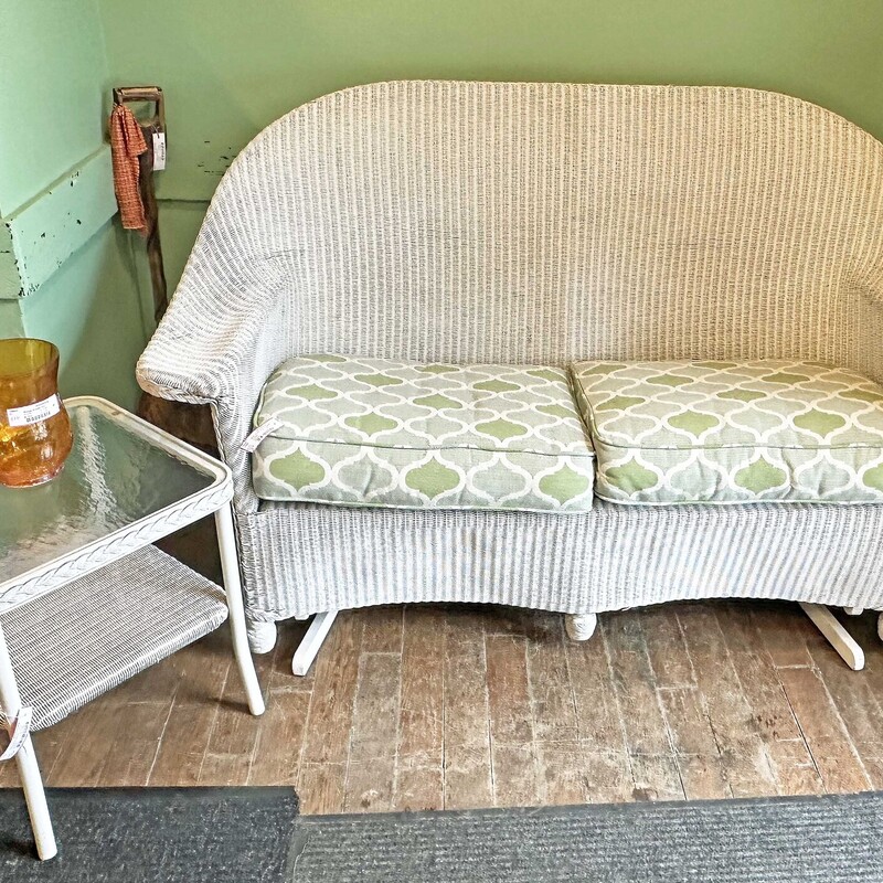 Vintage White Wicker Glider Settee
with Green Multi Cushions
61 In Wide x 28 In Deep x 38 In Tall.