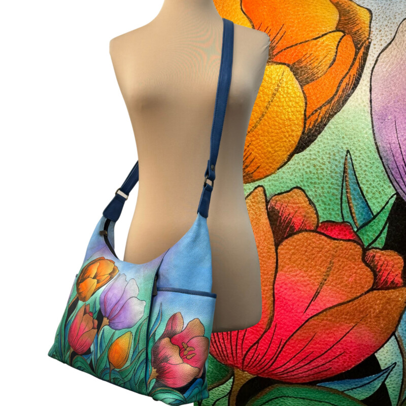 Anuschko Hand Painted Floral Handbag
Blue with Pink, Orange and PurpleTulips
All Leather
With Dust Cover
Zipper Closures