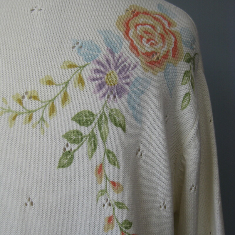 This is a white cotton/acrylic blend cardigan made in Korea.  It has painted flowers growing on all up and down the front, the hem and ends of the sleeves and one of the shoulders in the back.  Some of the flowers have a bit of beading sewn on.   It buttons closed with shaped pearlized buttons.<br />
It's marked size L, should fit pretty true but make sure using the measurements provided.<br />
Here are the flat measurements, please double where appropriate<br />
Shoulder to shoulder: 17.25<br />
Armpit to Armpit: 22.5<br />
Width at bottom: 20<br />
Length: 24<br />
Underarm sleeve seam length: 16.25<br />
Excellent condition, no flaws!<br />
thanks for looking.<br />
#74875