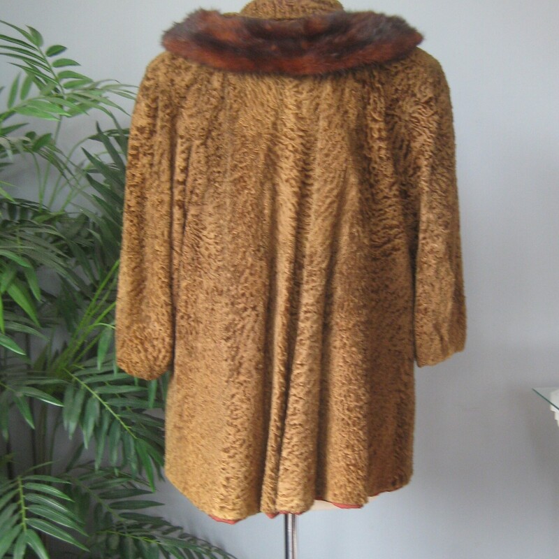 Vtg P Lamb Swing, Brown, Size: None<br />
This is a brown persian lamb jacket with a tacked on mink fur collar.<br />
It's very old, and heavy - I would guess its from the 1940s, and funky but very fun.<br />
It have a swing shape, 3/4 sleeves and the former owner sewed a mink collar on it. This collar is stitched only at the two ends, you could easily remove it or have me remove it for you or you can easily have it more fully attached if you like that look.<br />
Fully lined in an old style lining, with the former owners initial embroidered inside.<br />
<br />
armpit to armpit 25<br />
Length: 29<br />
<br />
It's in good shape, old and honestly a tiny bit musty, but for a fun night out it would keep you warm and turn heads!<br />
<br />
Thanks for looking!<br />
#70441