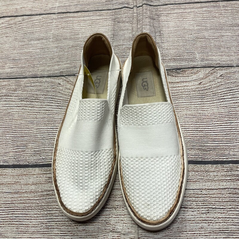 UGG slip on shoes off white with tan leather trim. Size 7.5