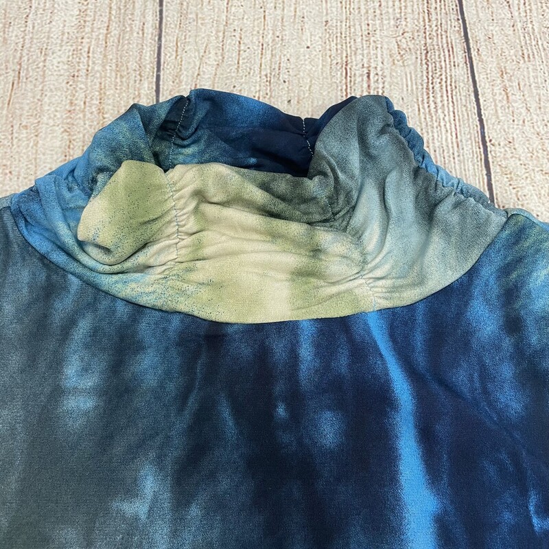 Tie dyed longer top. This has a high neck line, stretchy meterial.