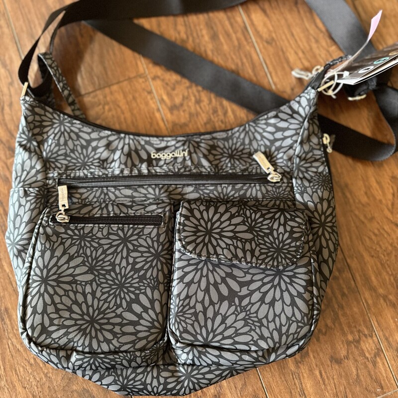 NWTBaggalini Everywhere Handbag GrayFloral Print<br />
New Tags Attached :$99.95<br />
Our Price ;$69.99<br />
<br />
All sales are final, No returns<br />
<br />
Shipping Is Available Or Pick Up In Store<br />
<br />
Thanks for shopping with us:-)