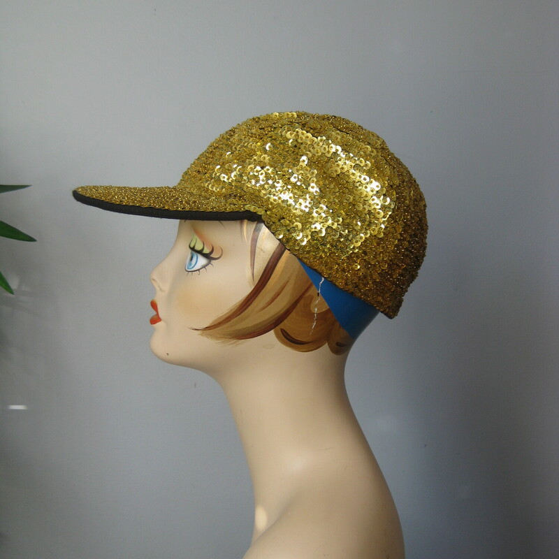 Sequin Cap, Gold, Size: None<br />
Super fun street style baseball cap completely covered in gold sequins.<br />
<br />
The center back has a bit of elastic so it should fit anyone.<br />
Fits me comfortably and my head is around 22 around (a little on the big side )<br />
great shape.<br />
thanks for looking!<br />
#74902