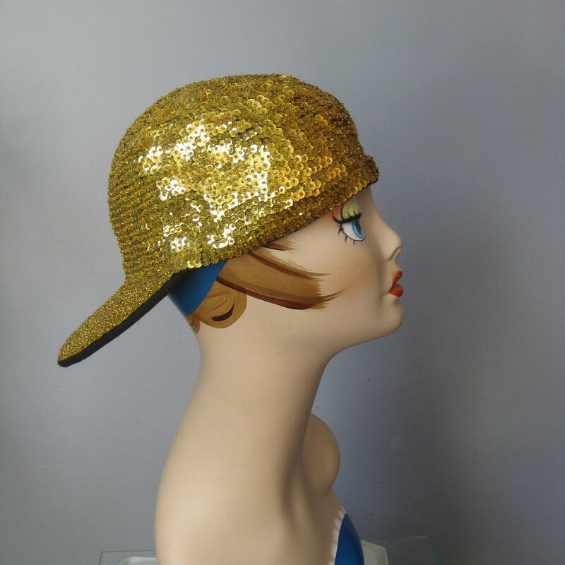 Sequin Cap, Gold, Size: None<br />
Super fun street style baseball cap completely covered in gold sequins.<br />
<br />
The center back has a bit of elastic so it should fit anyone.<br />
Fits me comfortably and my head is around 22 around (a little on the big side )<br />
great shape.<br />
thanks for looking!<br />
#74902