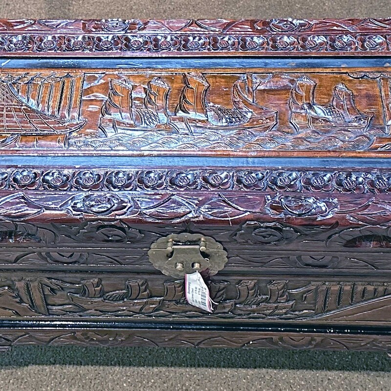 Asian Carved Chest,
Size: 27x13x14
Vintage carved chet depicting a fishing fleet.  In addition, there are lovely carved flower borders.  It is in very good condition and would make a great place to store what have youse!!