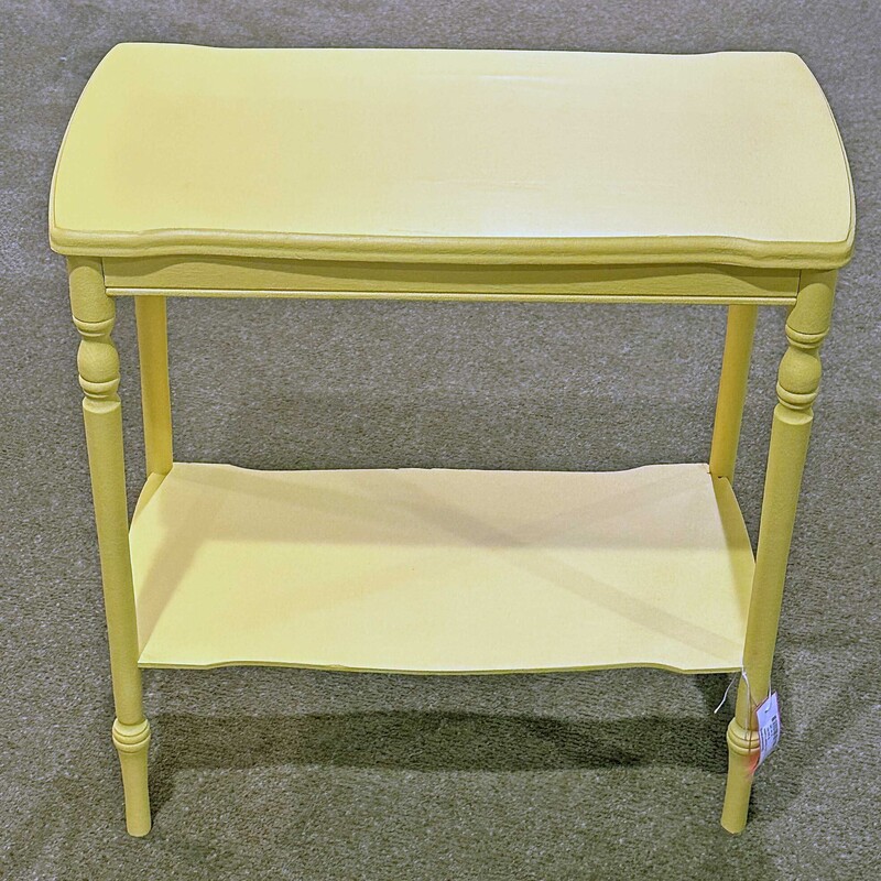 Yellow Two Shelf Table,
Size: 21x10x24
Nicely painted yellow 2 shelf table - would be great for plants...
