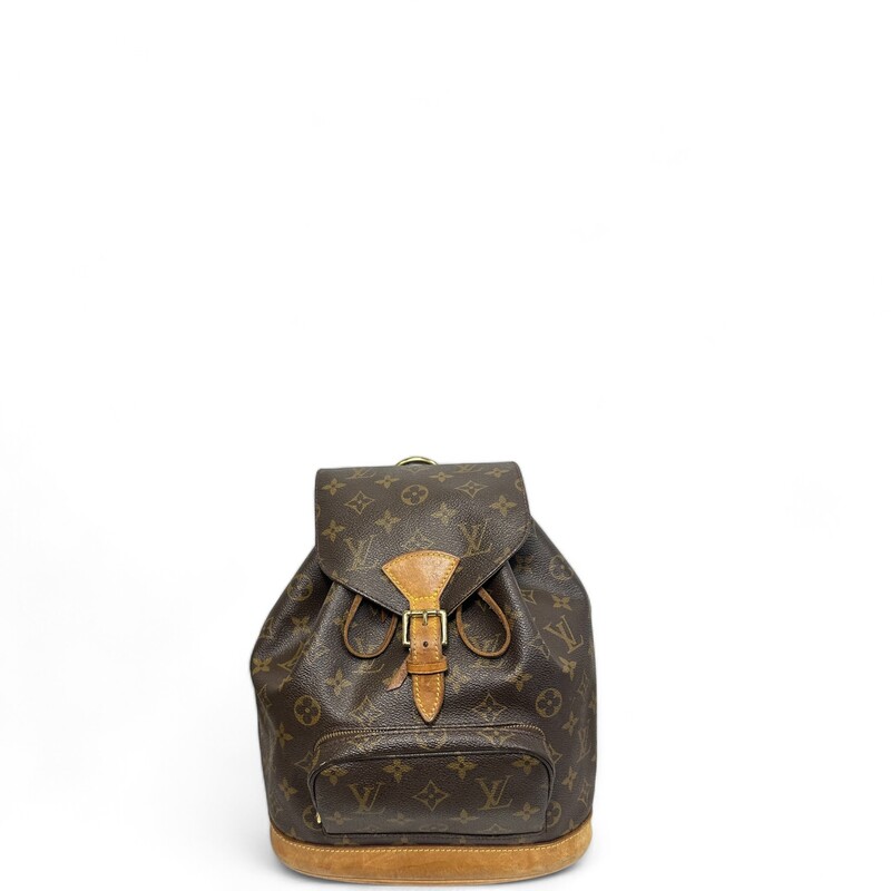 LOUIS VUITTON Monogram Montsouris Backpack. This versatile backpack is crafted of classic monogram coated canvas. The bag features a front zipper pocket, and natural vachetta cowhide leather trim including the base, top handle, and adjustable backpack straps. The bag opens with a belt buckle to a cocoa brown fabric interior.

Dimensions:
Base length: 8 in
Height: 9 in
Width: 4 in
Drop: 2 in
Drop: 14 in

Code: SP0020