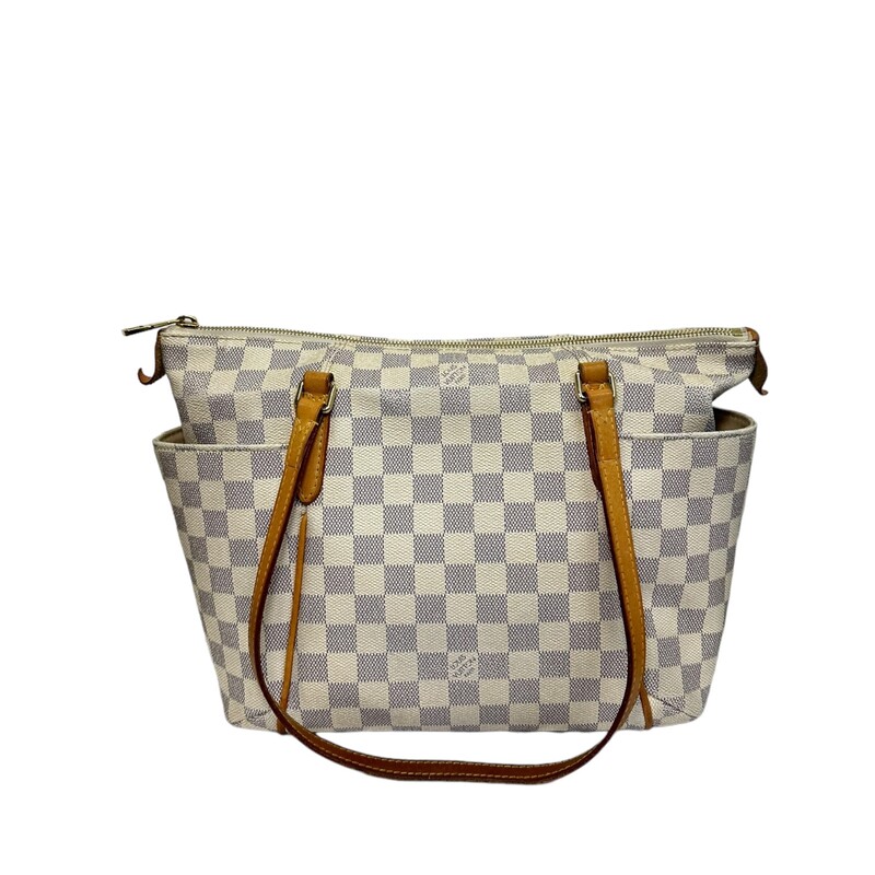 LOUIS VUITTON Damier Azur Totally PM. This stylish tote is crafted of Louis Vuitton's signature checkerboard coated canvas in blue and white. The bag features side slip pockets, vachetta cowhide leather shoulder straps and trim, and gold-plated hardware. The top zipper opens to an ivory fabric interior with patch pocket<br />
<br />
Dimensions:<br />
Base length: 11 in<br />
Height: 9.75 in<br />
Width: 5.5 in<br />
Drop: 9.25 in<br />
<br />
Date Code:<br />
SD4186