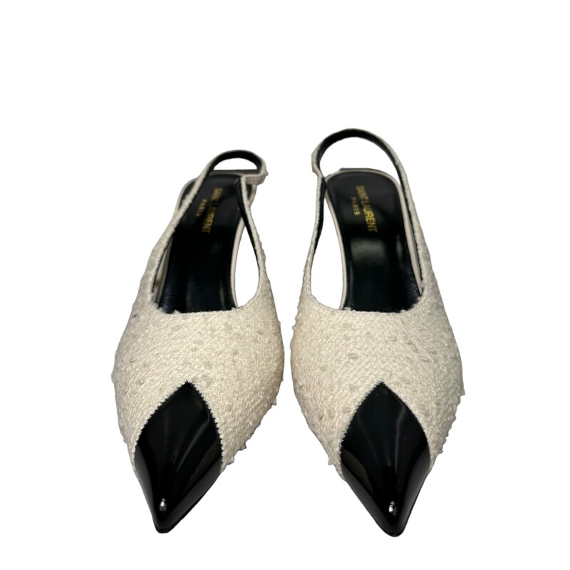 Saint Laurent Vesper Tweed<br />
Paneled boucle wool-blend and buffed leather heels in white and black. · Patent leather pointed toe · Slingback strap · Covered leather stiletto heel in white · Buffed leather sole in black ·<br />
Approx. 3.5 heel<br />
Optical white/Black<br />
Code: 680887