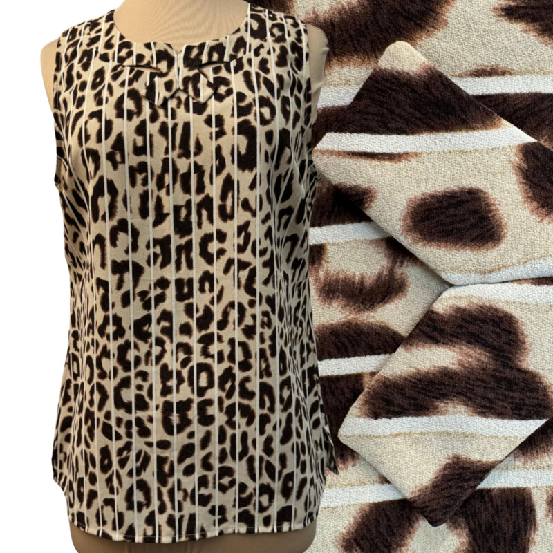 CAbi Ginger Leopard Sleeveless Blouse
Cute Bow Detail on Front
Size: Small