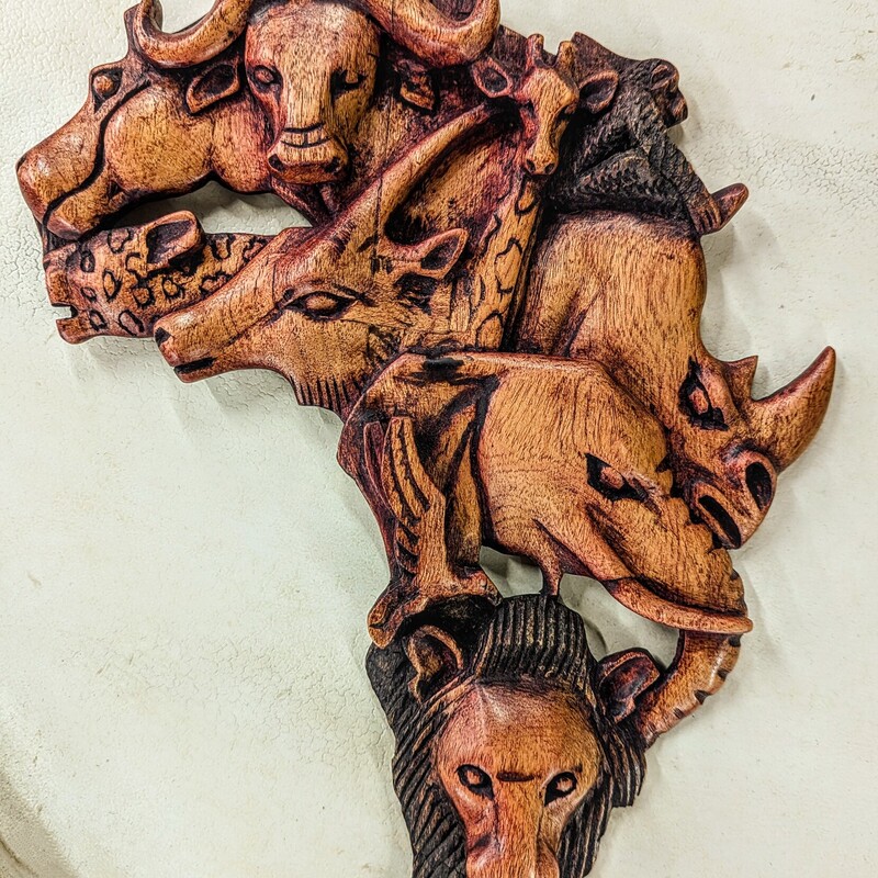 Wood Hand Carved African Animals In the Shape of Africa
Brown Size: 11 x 13H