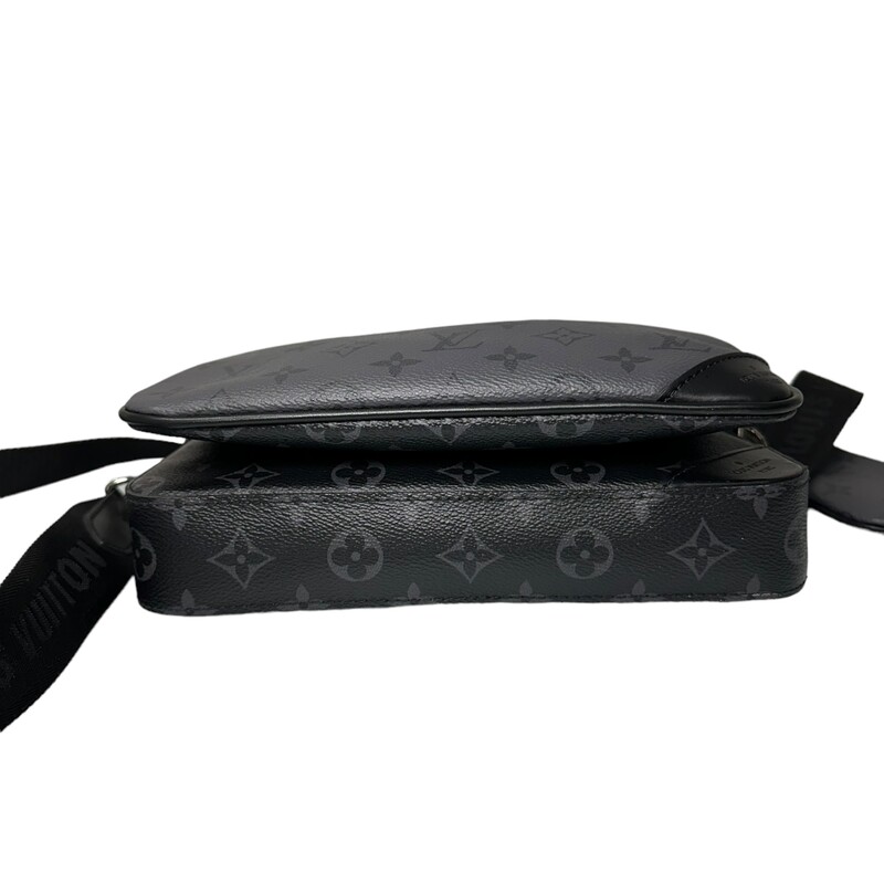 Louis Vuitton Trio Messenger<br />
<br />
Dimensions:<br />
9.8 x 7.3 x 2.8 inches<br />
(length x Height x Width)<br />
15.5-24.5 strap drop<br />
<br />
Date Code: Chipped<br />
<br />
The Trio Messenger bag from Monogram Eclipse canvas and its mirror twin, Monogram Eclipse Reverse. The iconic motif in tone-on-tone shades of gray complements the lines of this functional hybrid. More than a traditional cross-body bag, it has a removable zipped pocket and a removable coin purse attached to the strap