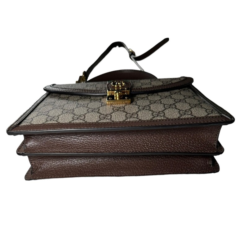 Gucci Ophidia Top Handle, Monogram Crossbody<br />
Beige and ebony GG Supreme canvas<br />
Brown leather trim<br />
Shiny gold-toned hardware<br />
Green and red House Web<br />
Microfiber lining with suede-like finish<br />
Inserts contain leather made through an alternative metal or chrome free tanning process, reducing the environmental footprint compared to traditional methods.<br />
Double G<br />
Internal: zip pocket and open pocket<br />
Strap length: 36.2 - 40.2<br />
Handle with 4 drop<br />
Detachable and adjustable shoulder strap drop: 18.1 - 20.5<br />
Magnetic closure<br />
Made In italy<br />
<br />
Dimensions:<br />
 9.8W x 6.9H x 2.8D<br />
<br />
*Some minor marks on hardware