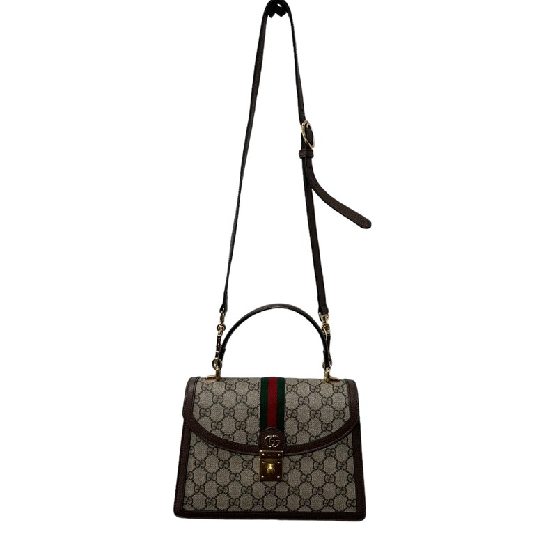 Gucci Ophidia Top Handle, Monogram Crossbody<br />
Beige and ebony GG Supreme canvas<br />
Brown leather trim<br />
Shiny gold-toned hardware<br />
Green and red House Web<br />
Microfiber lining with suede-like finish<br />
Inserts contain leather made through an alternative metal or chrome free tanning process, reducing the environmental footprint compared to traditional methods.<br />
Double G<br />
Internal: zip pocket and open pocket<br />
Strap length: 36.2 - 40.2<br />
Handle with 4 drop<br />
Detachable and adjustable shoulder strap drop: 18.1 - 20.5<br />
Magnetic closure<br />
Made In italy<br />
<br />
Dimensions:<br />
 9.8W x 6.9H x 2.8D<br />
<br />
*Some minor marks on hardware