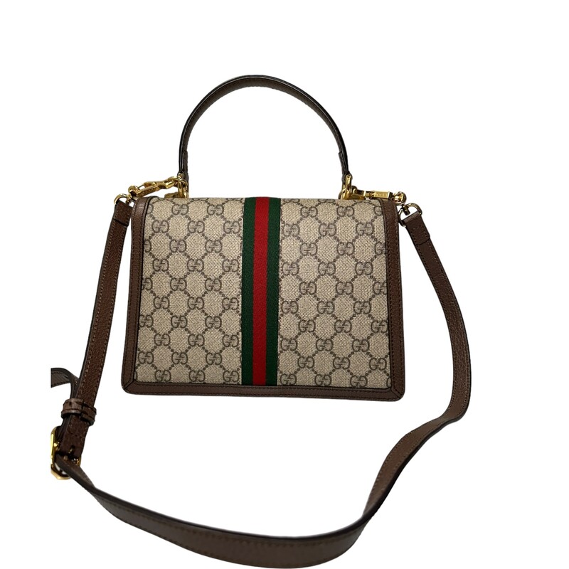 Gucci Ophidia Top Handle, Monogram Crossbody<br />
Beige and ebony GG Supreme canvas<br />
Brown leather trim<br />
Shiny gold-toned hardware<br />
Green and red House Web<br />
Microfiber lining with suede-like finish<br />
Inserts contain leather made through an alternative metal or chrome free tanning process, reducing the environmental footprint compared to traditional methods.<br />
Double G<br />
Internal: zip pocket and open pocket<br />
Strap length: 36.2 - 40.2<br />
Handle with 4 drop<br />
Detachable and adjustable shoulder strap drop: 18.1 - 20.5<br />
Magnetic closure<br />
Made In italy<br />
<br />
Dimensions:<br />
 9.8W x 6.9H x 2.8D<br />
<br />
*Some minor marks on hardware