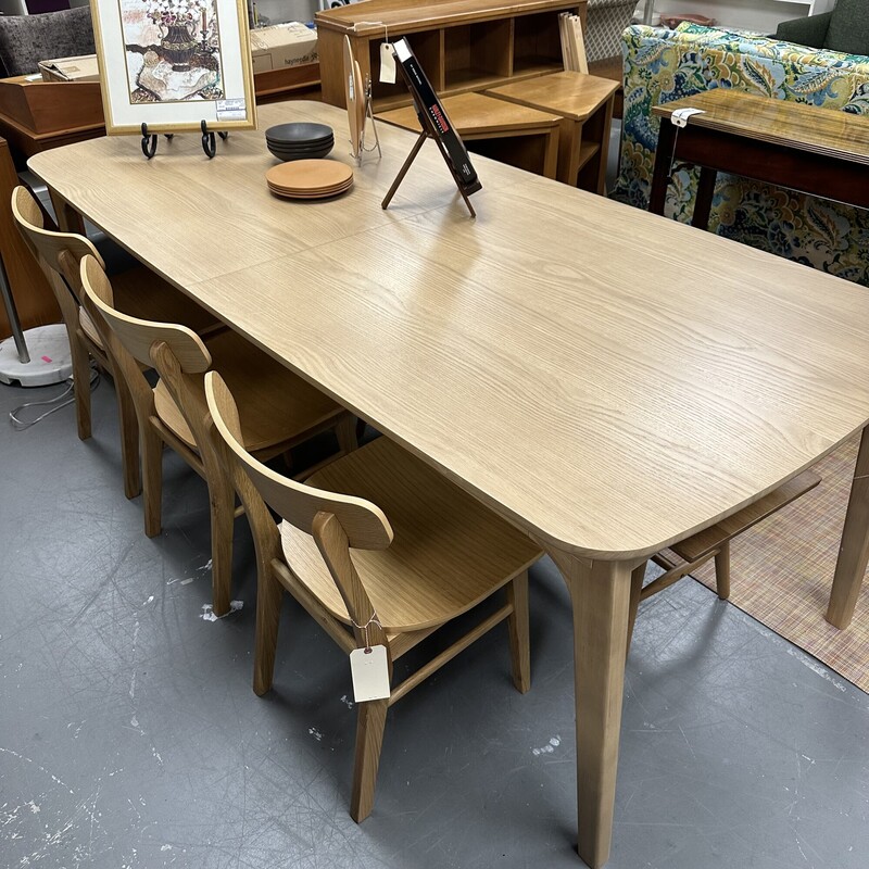 Large Mid Century Modern Extendable Dining Table, White Oak. Has a self storing leaf that allows the table to expand another 20in.<br />
Size: 93x32