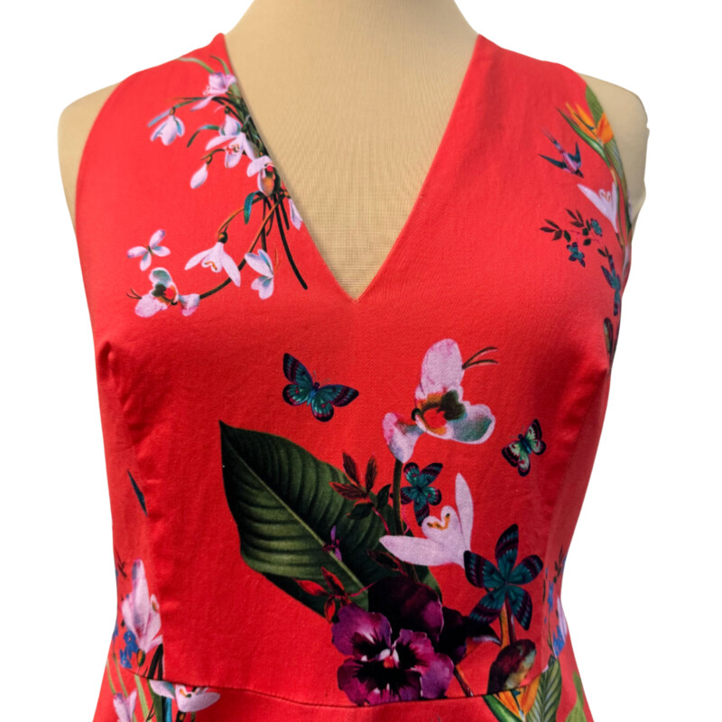 Ted Baker Eselle Floral Dress<br />
Butterfly and Flower Print<br />
Adjustable Straps<br />
Cotton Blend<br />
With Pockets<br />
Color:  Geranium Red, Navy, and Colorful Flowers and Butterflies<br />
Size: US Size: 8-10 Ted Baker Size: 4