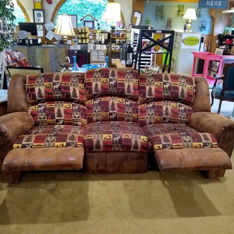 Rustic Microfiber Couch

Rustic looking couch with tan microfiber fabric and moose, bear, and cabin tan, red and black fabric on seats and back.  Both ends recline manually. Couch is in good condition.

Size: 91 in wide X 36 in deep X 39 in high