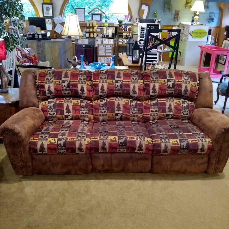 Rustic Microfiber Couch

Rustic looking couch with tan microfiber fabric and moose, bear, and cabin tan, red and black fabric on seats and back.  Both ends recline manually. Couch is in good condition.

Size: 91 in wide X 36 in deep X 39 in high
