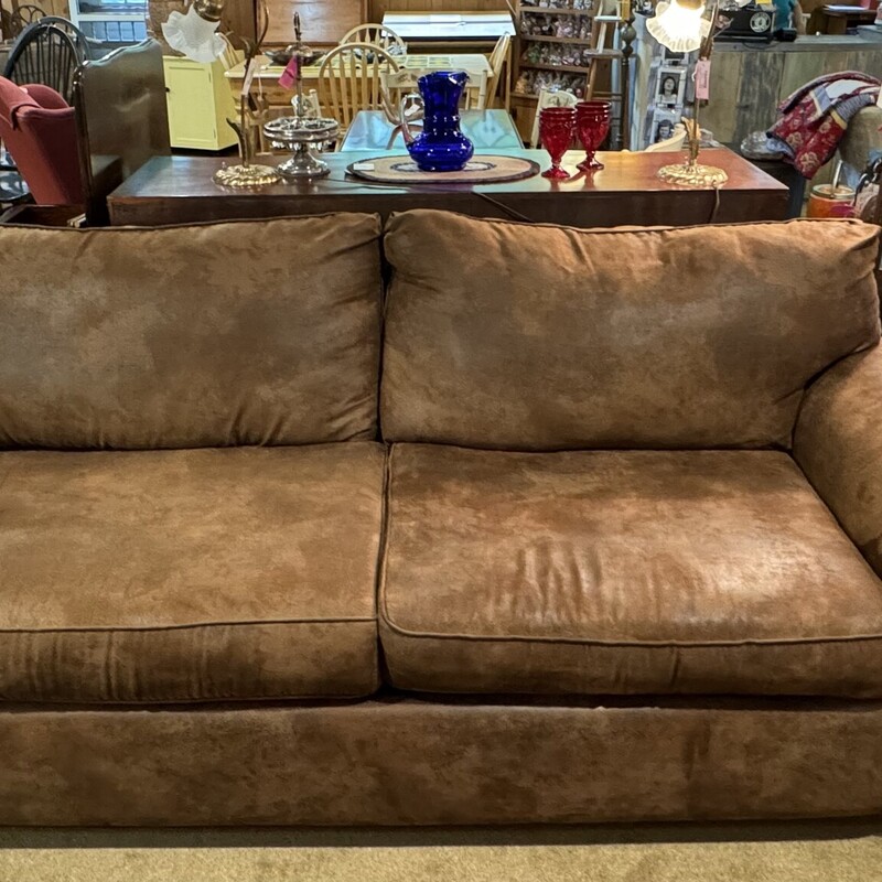 Klaussner Brown Sofa
Microfiber, looks like Leather, Nailhead Trim on front Sides
88 Inches Long, 35 Inches Deep, 36 Inches