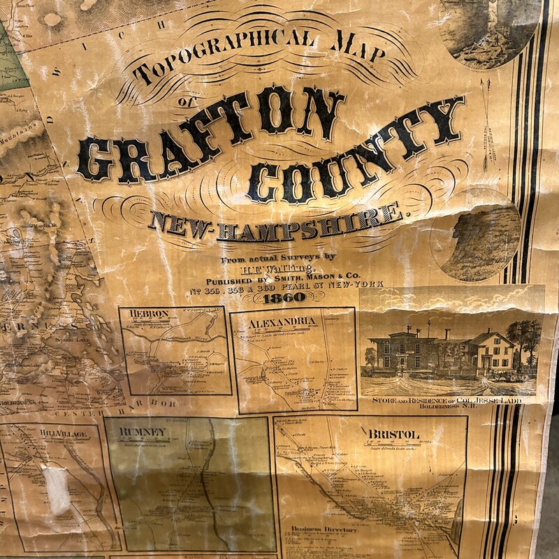 1860 Grafton County Map<br />
Size: 62x62<br />
If you like history, this map is for you!!  The topographical map was published by Smith, Mason & Co. in New York.  The vingnettes include Pemigewasset House, Plymouth, Vails Water Cure Intitute, Hill and much more... The inserts include Plymouth, Holderness, Rumney, Campton and many more!  There are some areas that show their age, but it is in overall good shape.  Mounted on two black painted rods and has two loops to hang it with.  Great piece of history!!